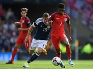 GLASGOW, SCOTLAND - JUNE 10:  Marcus Rashford of England attempts to get away from James McArthur of Scotland during the FIFA 2018 World Cup Qualifier between Scotland and England at Hampden Park National Stadium on June 10, 2017 in Glasgow, Scotland.  (Photo by Mike Hewitt/Getty Images)
